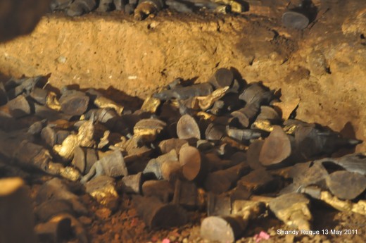A Stash of Buddhas in a Hole