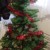 Tadaaaaa! One line of tinsel has been wrapped around the tree, we can now add another one.... Tadaaaaa! One line of tinsel has been wrapped around the tree, we can now add another one....