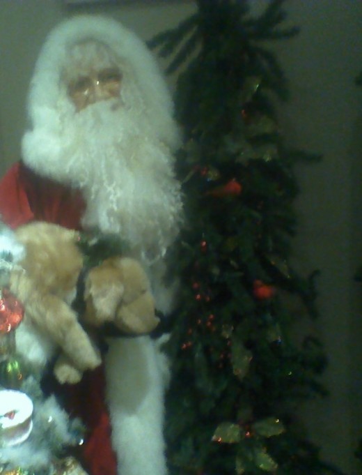Father Christmas with a plush canine friend