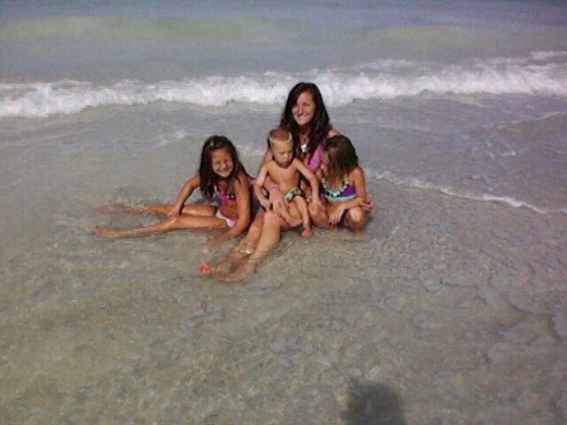 My middle daughter and her kids at the Gulf of Mexico. Photo by Holle Abee.
