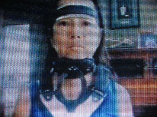 The braced face of  Ex-President Gloria Macapagal-Arroyo due to neck operation (As seen on TV-Photo by Travel Man)