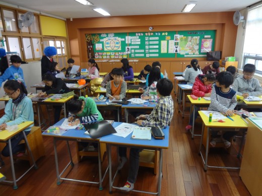 One class making Halloween masks.