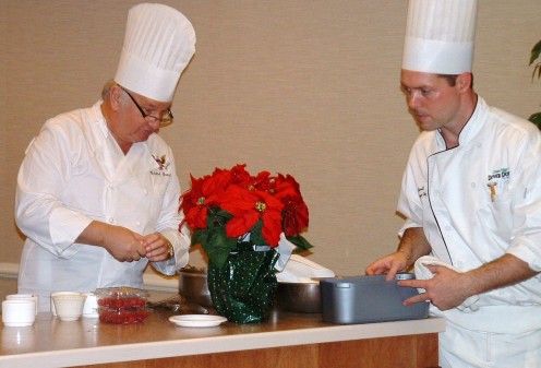 Chef Mesnier and assistant from Dover Downs Hotel making preparations for food demonstration at the Chocolate Festival. 