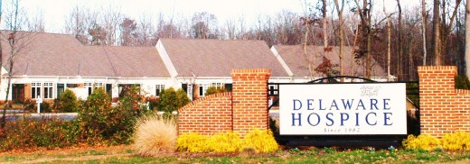 The gazebo and gardens in the next photo are between the sign and the back of the hospice building. 