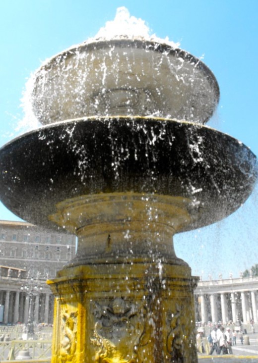 A fountain in the forecourt of the Vatican City - Rome is filled with fountains that you can drink from and everyone wanted to drink from this one.  I did too, just because, but I still have my doubts about its purity... but then, I'm Scottish!