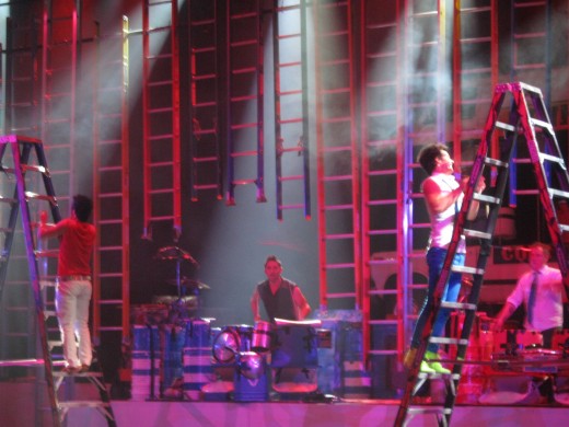 Using ladders as percussion instruments.