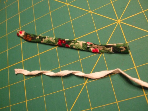The loop after it has been folded and sewn.  also, a piece of thin shoelace works.