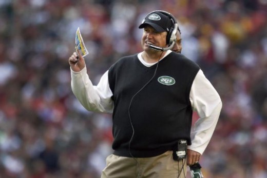 New York Jets coach Rex Ryan reacts to a play during the second half of an NFL football game against the Washington Redskins in Landover, Md., Sunday, Dec. 4, 2011. (AP Photo/Evan Vucci)