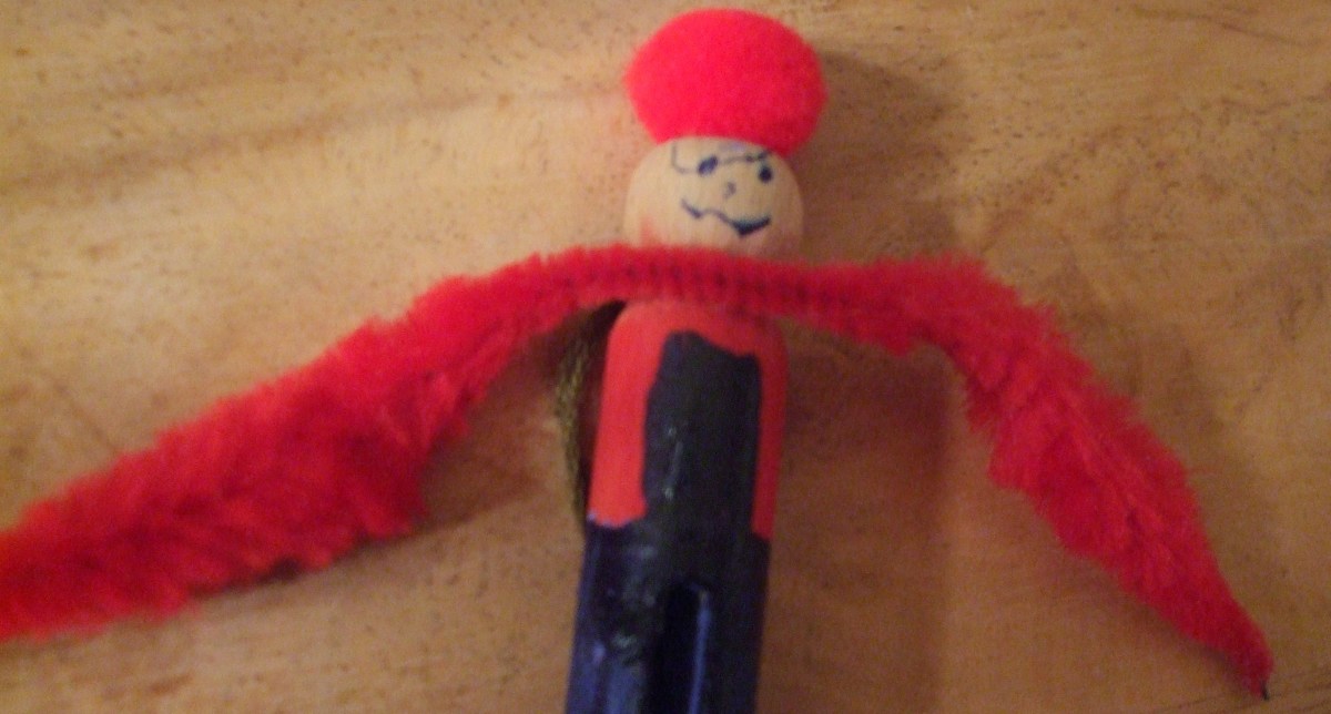 The beginning step in attaching the pipe cleaner arms.