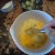 Whisking together the eggs, Ricotta, oregano, and the Romano cheese