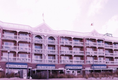 Ocean front rooms and suites with private balconies are available at the Boardwalk Plaza Hotel. Victoria's Restaurant also has a boardwalk entrance which can be seen to the right. In warm weather there is outdoor seating under the two large canopies.