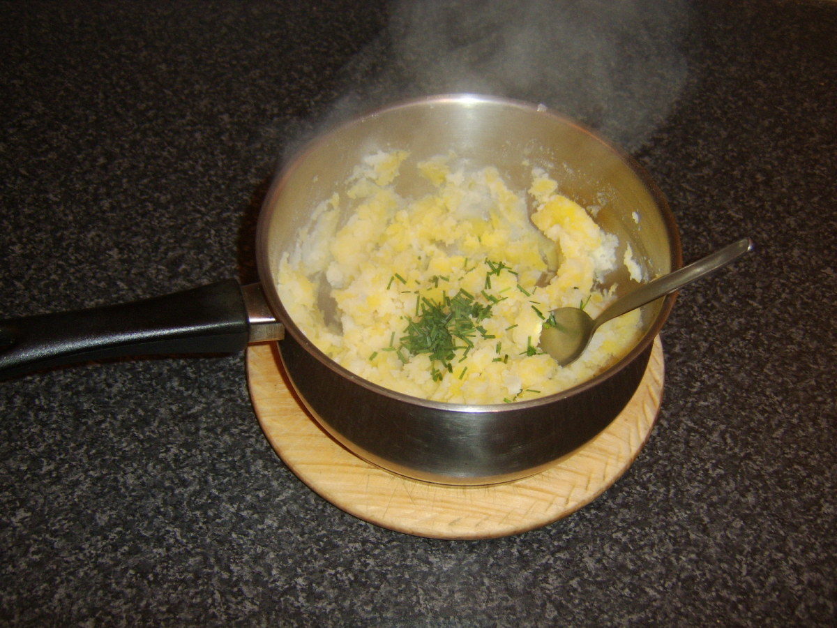 Chopped chives are added to the mashed potato and Swede
