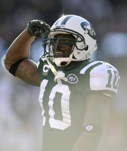 New York Jets' Santonio Holmes reacts after scoring a TD during the 2nd quarter the football game against the KC Chiefs Sunday 12/11/11, in  N.J. (AP Photo/Bill Kostroun)