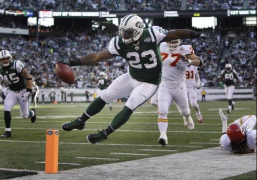 New York Jets' Shonn Greene gets his hand on the ball before running out of bounds during the second quarter of the NFL football game against the Kansas City Chiefs on Sunday, Dec. 11, 2011, in East Rutherford, N.J. (AP Photo/Kathy Willens)