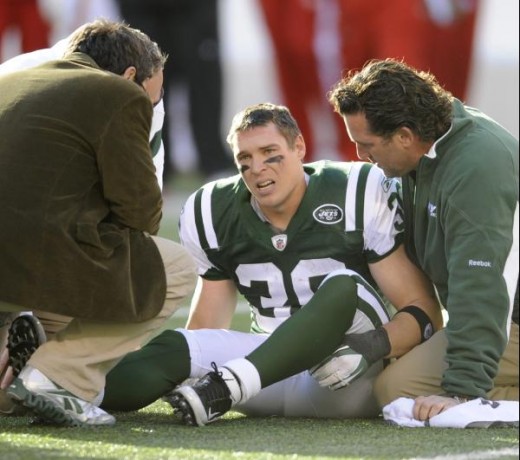 New York Jets' Jim Leonhard sits on the ground after being injured during the second quarter of the NFL football game against the Kansas City Chiefs on Sunday, Dec. 11, 2011, in East Rutherford, N.J. (AP Photo/Bill Kostroun)