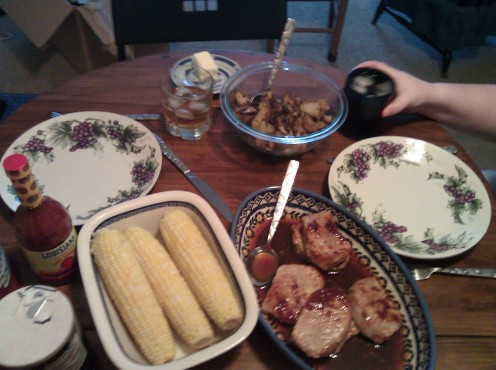 One of our first gluten-free dinners: roasted corn, pork chops with homemade sweet-and-sour sauce, and home fries.