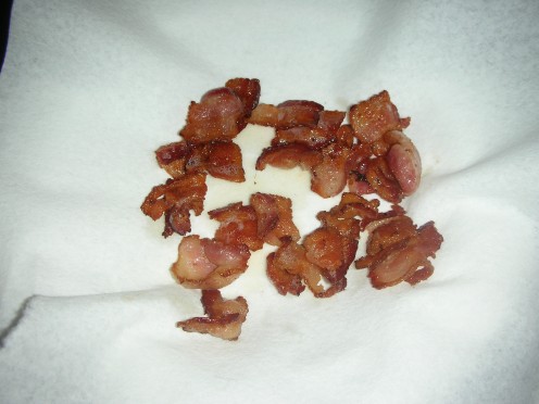 Bacon draining on paper towel