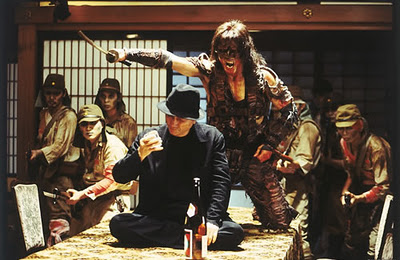Izo leading the army of zombie soldiers.  In front of his is the singer/narrator of the story. The singer randomly appears in places that Izo is.