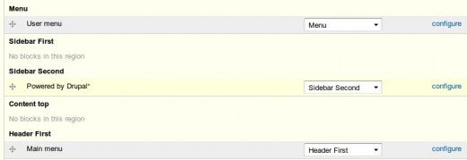 Some of the regions, including Powered by Drupal in the directory admin/structure/block