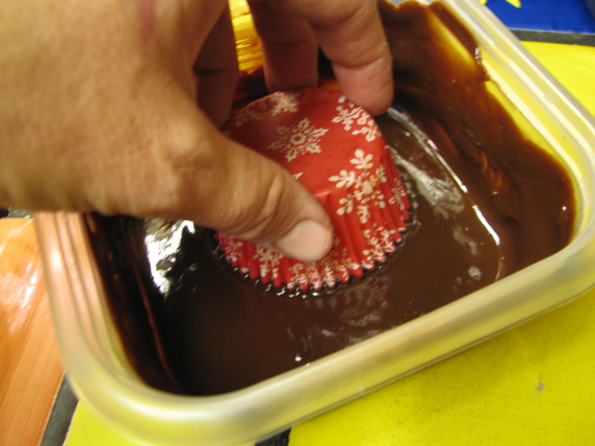 Dip cupcakes into the chocolate or frosting and swirl until covered (so easy!). 