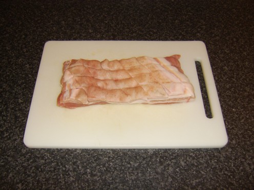 Score the skin side of the belly pork