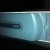 The button you press to release the hard drive is located between the hard drive and a vent. The button you press to release the hard drive is located between the hard drive and a vent.