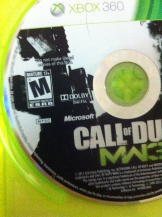 The region code is listed on most discs. For example, in this picture of the COD: Modern Warfare 3 discs, the NTSC region code appears beneath the ESRB rating.
