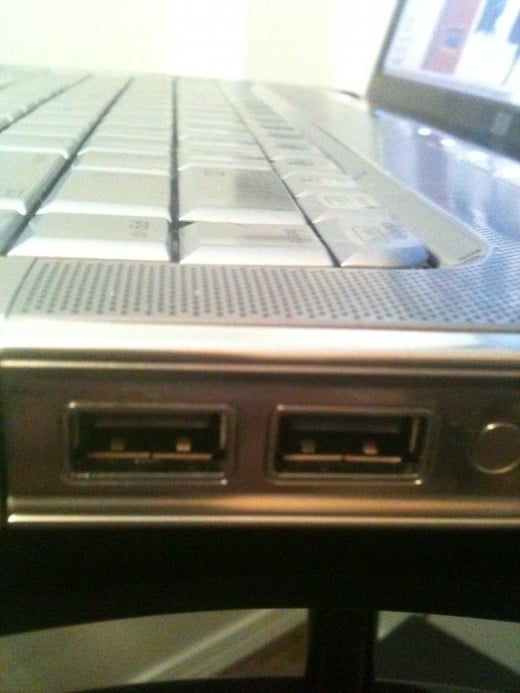 Check the USB ports on your computer to ensure there's nothing in the port that could prevent the computer from recognizing the connected HP printer/scanner.