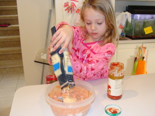 Adding the shredded cheese.