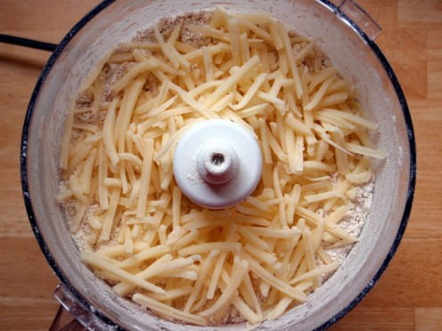 If you don't have shredded cheese you can easily shred it from a block of cheese in your food processor. 