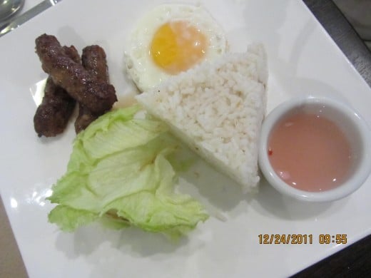 hubby's breakfast of rice, longganisa (Filipino sausage) and egg