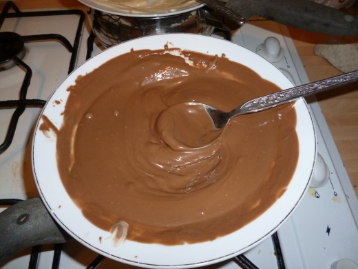 Melt the chocolate over a simmering pan of water or use the microwave but stir every 10 seconds to ensure that it doesn't burn.