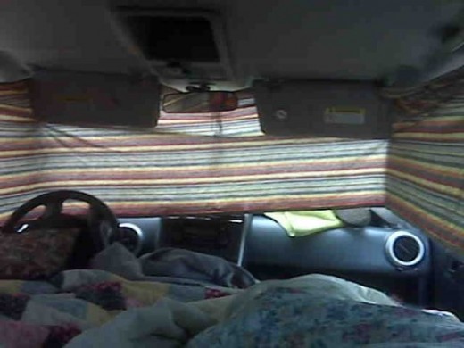 Here's our set up.  The interior of our car with the curtains up for privacy.