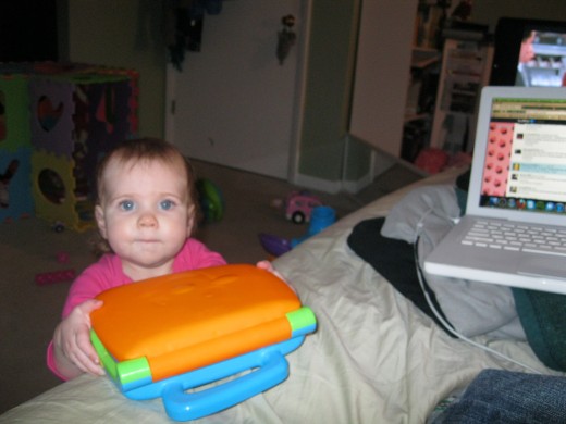 Cupcakes with her computer