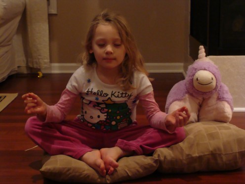 Relaxed pose, dim lighting and comfortable clothing all aid in making mediation easier for children.  You can even have a friend meditate with you!