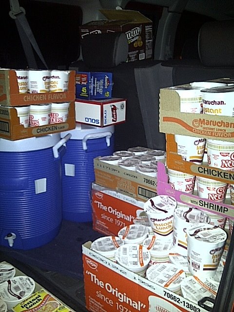 Cases of Soup, Thermoses of Hot water, water bottles, forks and snacks 