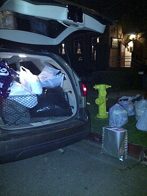 One of our cars loaded with bags for clothing for distribution.