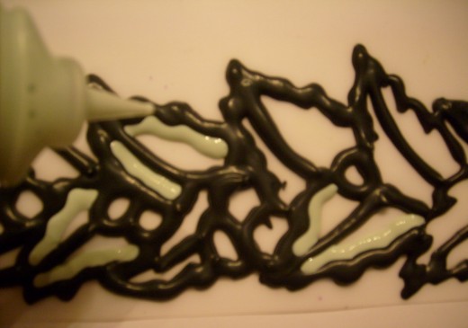 Apply lighter creamy green only to leaf's edge.