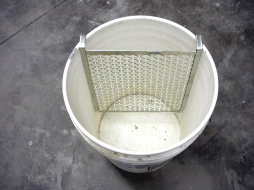Roller grids are a wise option for large buckets; it saves trying to pour from a heavy container into a tray