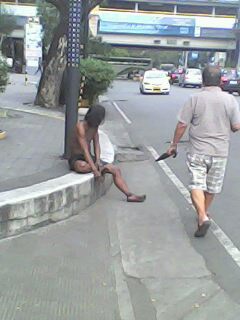 The legendary TAONG GRASA (Greasy Man) in the Philippines - let's help him!!! (Photo from Cellular phone by Travel Man)