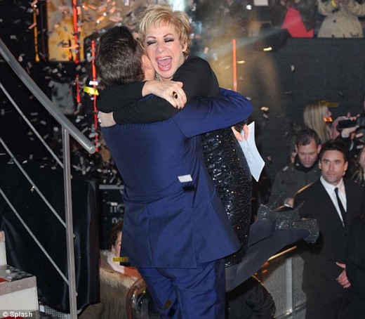 An overjoyed Denise Welch hugs Big Brother host Brian Dowling after winning the 2012 series