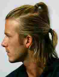 David Beckham who must change his harstyle more than most.  This not how I like a man's hair, but Posh might