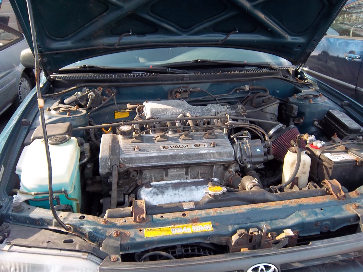 How to Change the Oil in a 1994 Toyota Corolla | AxleAddict 1997 camry fuel filter location 