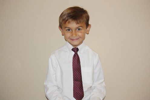My son sporting his tie at a friend's wedding!