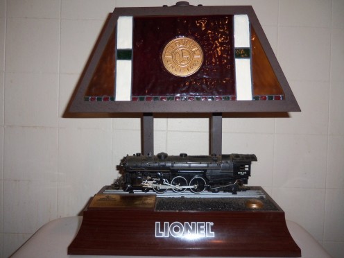 The Lionel lamp complete with running train and whistle sounds 