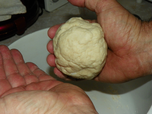 Work the dough until no longer sticky, a little "extra" hot water may be needed, but not much!