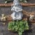 Angel Fred watches over our container garden with radishes that are just about ready to harvest. Angel Fred watches over our container garden with radishes that are just about ready to harvest.