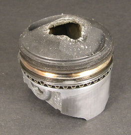 Pre-Ignition burnt straight through the piston crown.