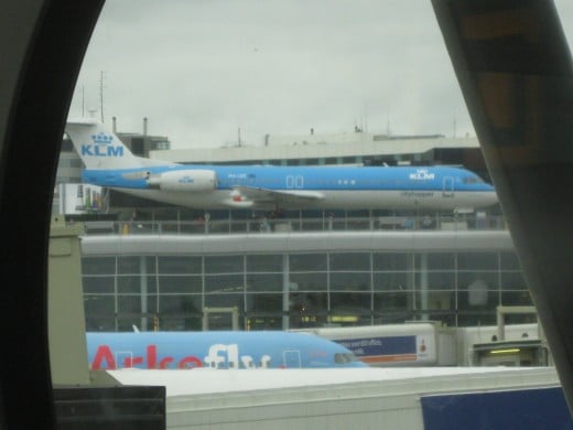 KLM Cityhopper Fokker 100 aircraft that siting atop the Panorama Terrace at Amsterdam Airport Schiphol 
