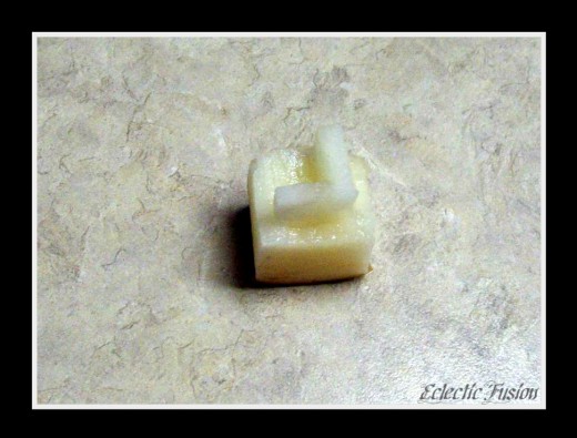 Potato stamp. Make sure you carve the letter backwards so it will be facing the right way when you stamp!